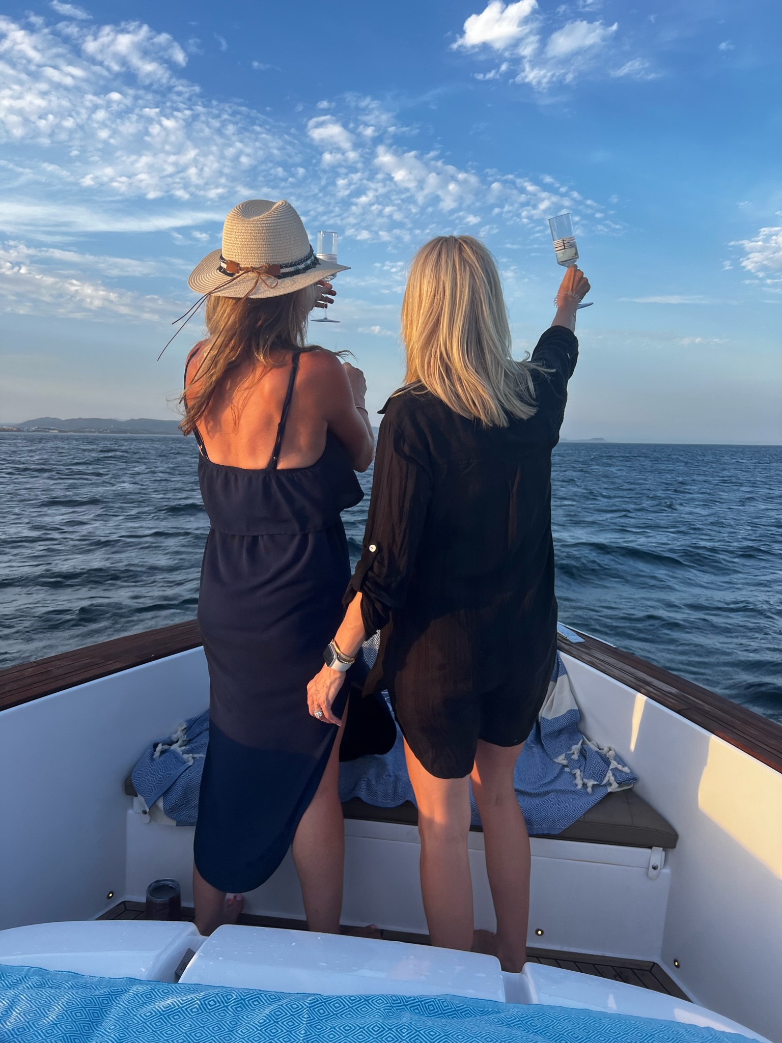 Champagne toast on Bésame Cabo
