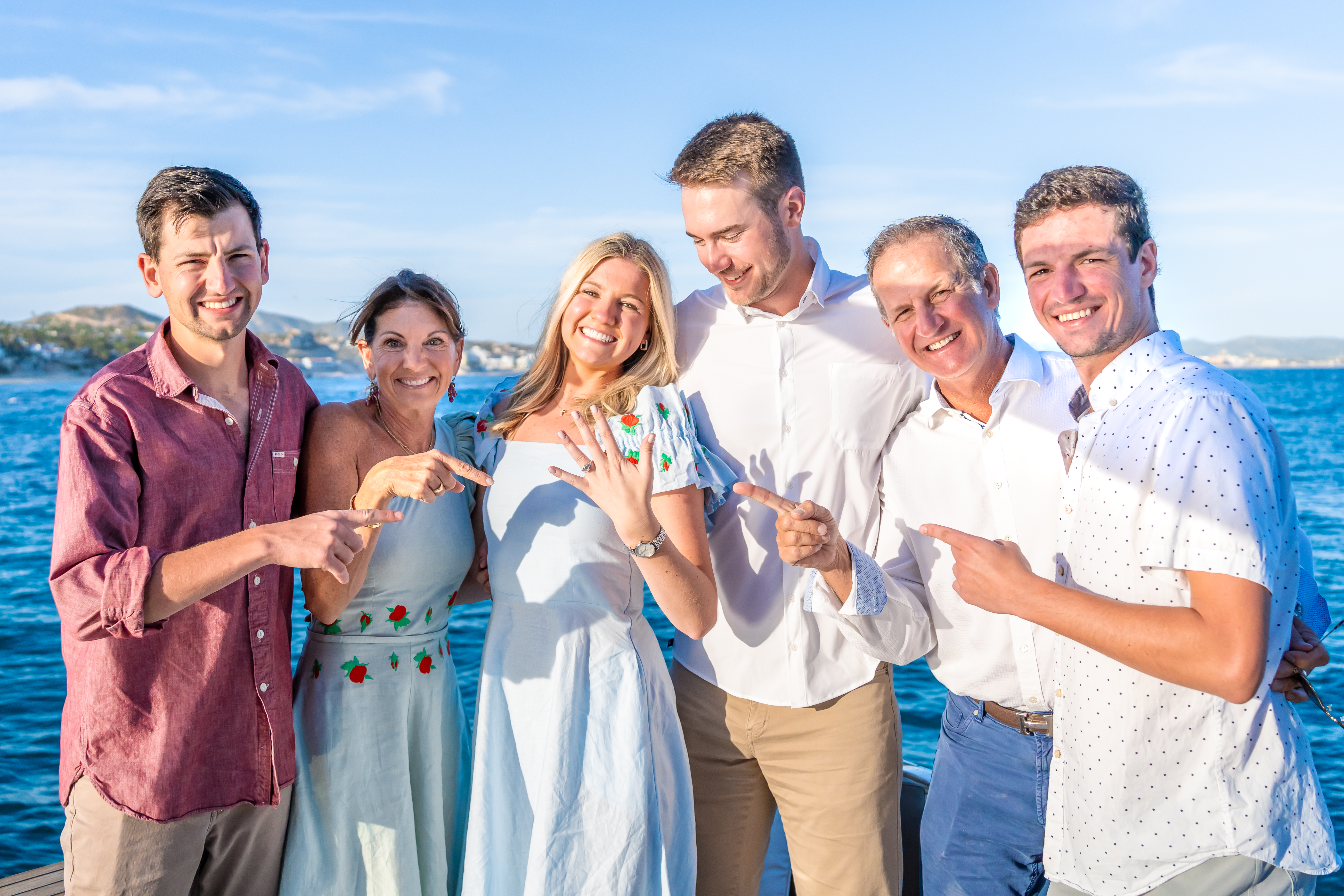 Family celebrating on Bésame Cabo